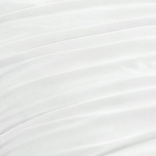 Close-up of the Amelie Bows Ruched Comforter Set shows white fabric with soft, diagonal pleats for a textured, layered look. The ultra-soft material appears smooth, with evenly spaced ruching that adds elegance to your bedding.
