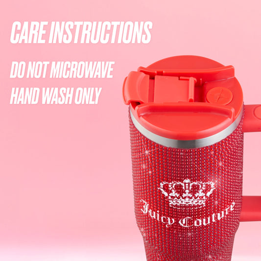 A Diamond Bling Stainless Steel Tumbler with Handle and Straw, 30 oz, in vibrant red and adorned with sparkling rhinestone details, is displayed against a pink background. White text reads: “Care Instructions: Do not microwave. Hand wash only.” This dazzling tumbler brings a touch of glamour to your drinkware collection.