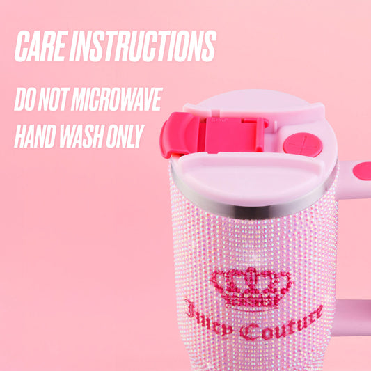 A pink Diamond Bling Stainless Steel Tumbler with Handle and Straw, 30 oz by Juicy Couture is shown, featuring rhinestones and a crown logo. Text reads: “Care instructions. Do not microwave. Hand wash only.” Both the background and lid are pink.