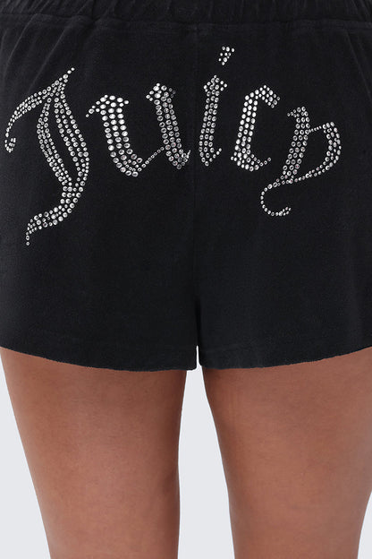 A close-up of a person wearing Big Bling Washed Terry Shorts, featuring black terry fabric, a sparkling rhinestone Juicy logo across the back, and a comfy drawstring waistband.