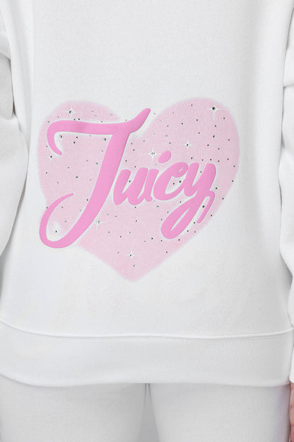 Someone wearing the Sweetheart Fleece Oversized Hoodie, a white oversized hoodie featuring a large pink heart and "Juicy" in cursive with sparkles on the back—ideal for a casual, cozy look.