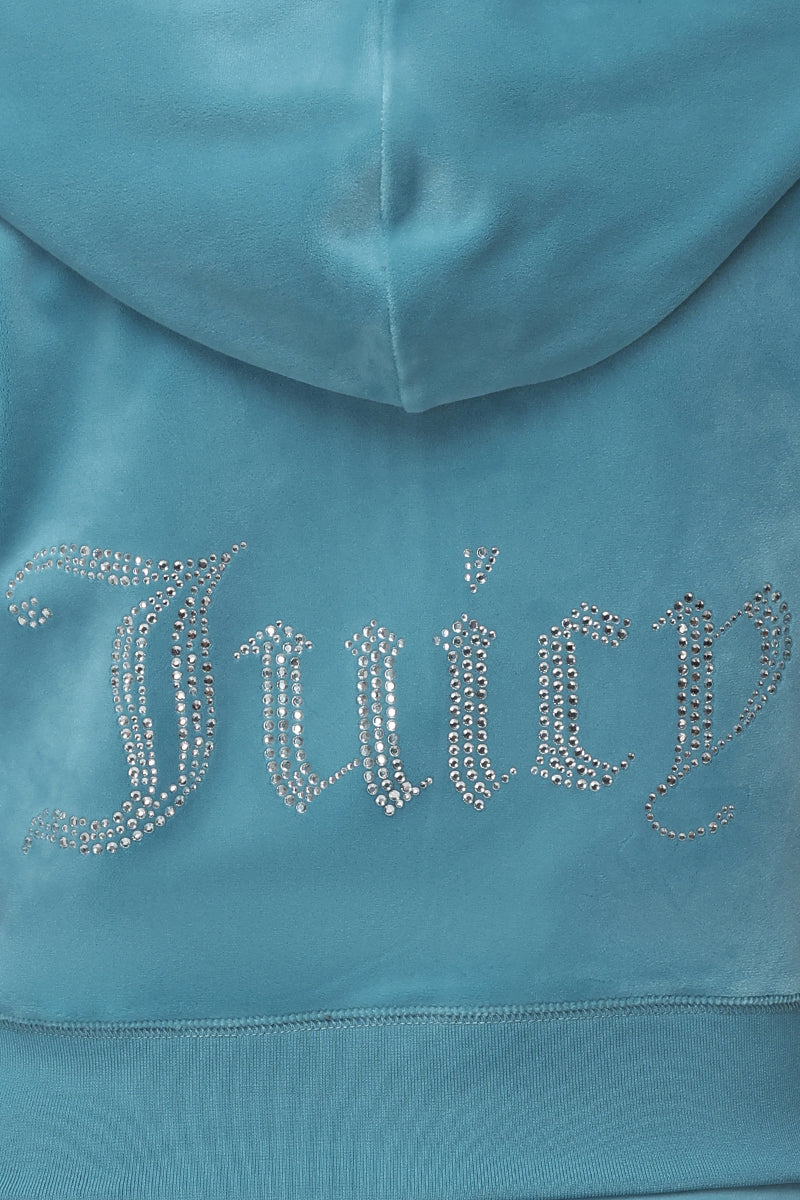 A close-up of the OG Big Bling Velour Hoodie featuring "Juicy" spelled out in silver rhinestone embellishment on the back.