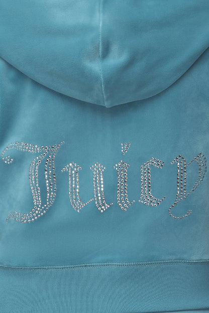 A close-up of the OG Big Bling Velour Hoodie featuring "Juicy" spelled out in silver rhinestone embellishment on the back.
