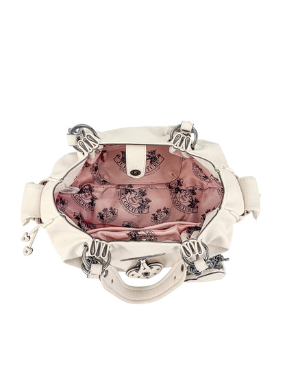 The Vintage Vibes Satchel Bag features a cream exterior, silver hardware, and an open view of its pink satin lining with a Juicy logo print—ideal for fans of retro glamour.