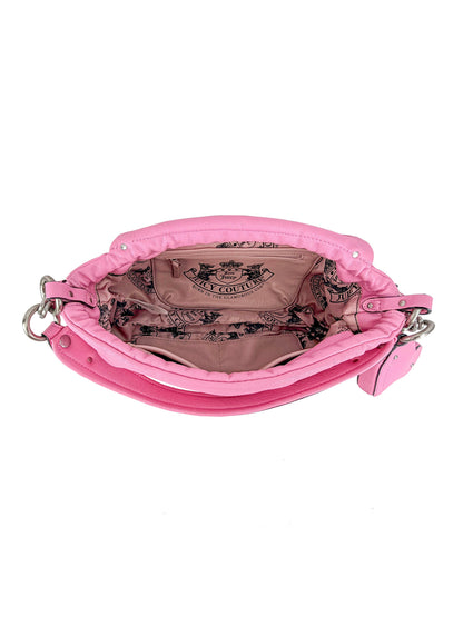 The Vintage Vibes Hobo Bag is a stylish pink handbag featuring an open top, a spacious light pink interior with a decorative printed logo, and multiple inner pockets—ideal for achieving chic vintage-inspired looks.