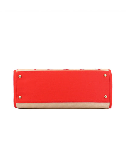 The Cherry Pop Item Tote Bag features a bright red rectangular base, tan edges, and gold-tone metal studs at each corner—perfect for your everyday essentials—displayed from the bottom view.