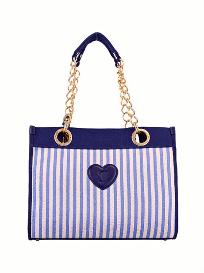 The Scottie Dog Item Tote Bag features blue and white vertical stripes, gold chain handles, and a blue heart-shaped patch with the Juicy Couture symbol on the front.