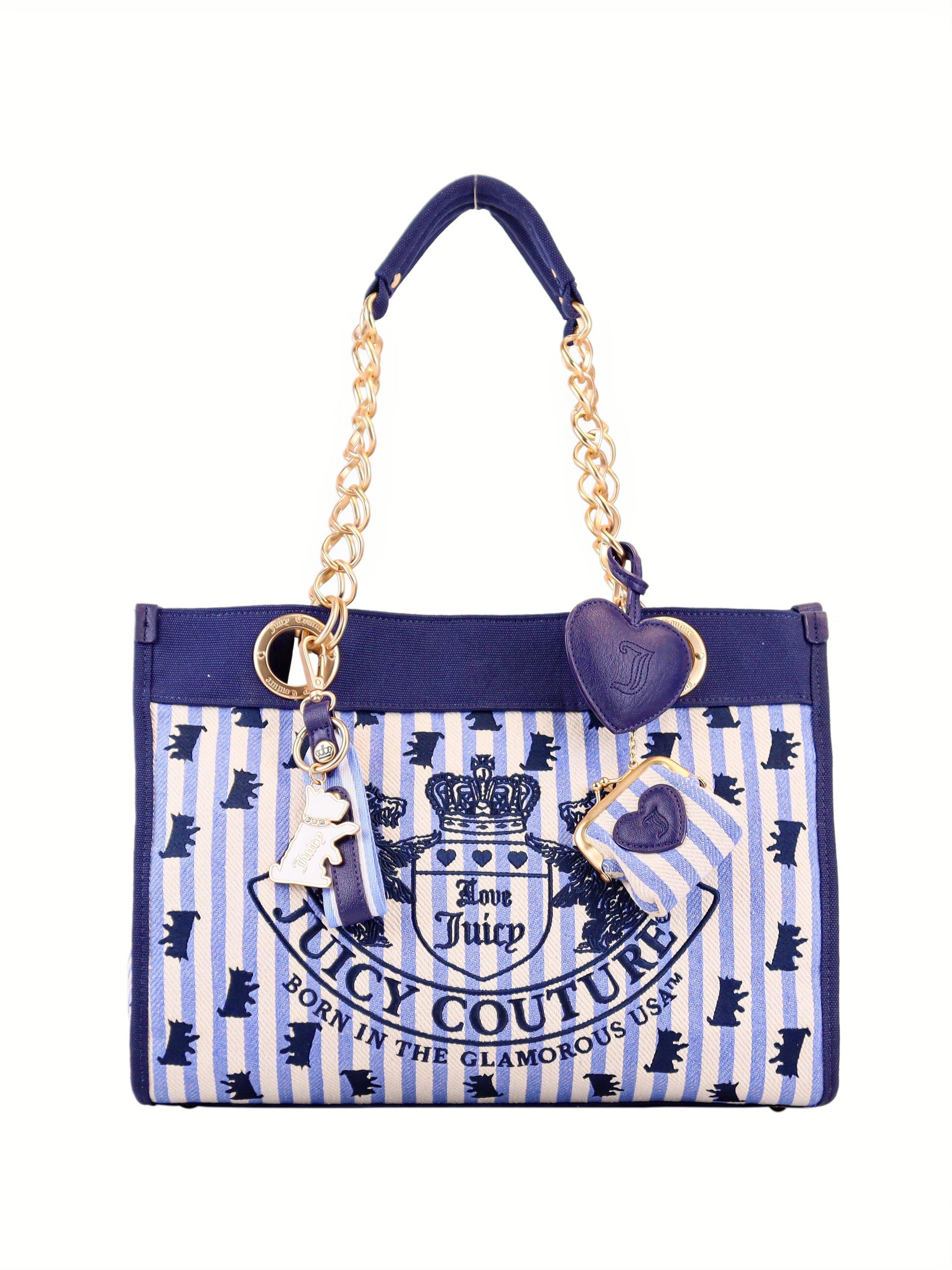 A blue and white striped Scottie Dog Item Tote Bag with gold chain handles, heart and key charms, the signature symbol crest logo, and "Born in the Glamorous USA" text.