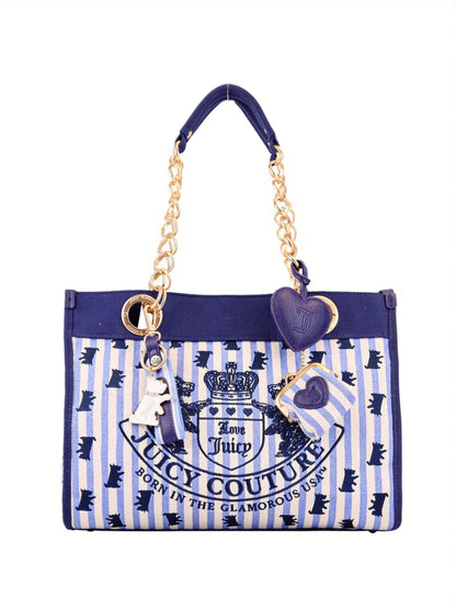 A blue and white striped Scottie Dog Item Tote Bag with gold chain handles, heart and key charms, the signature symbol crest logo, and "Born in the Glamorous USA" text.
