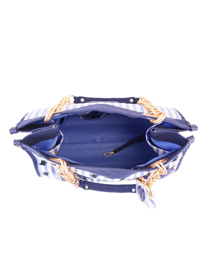 Top view of an open Scottie Dog Item Tote Bag with blue and white stripes, gold chain handles, spacious blue interior, a black leash clip inside, and the signature symbol for added style.