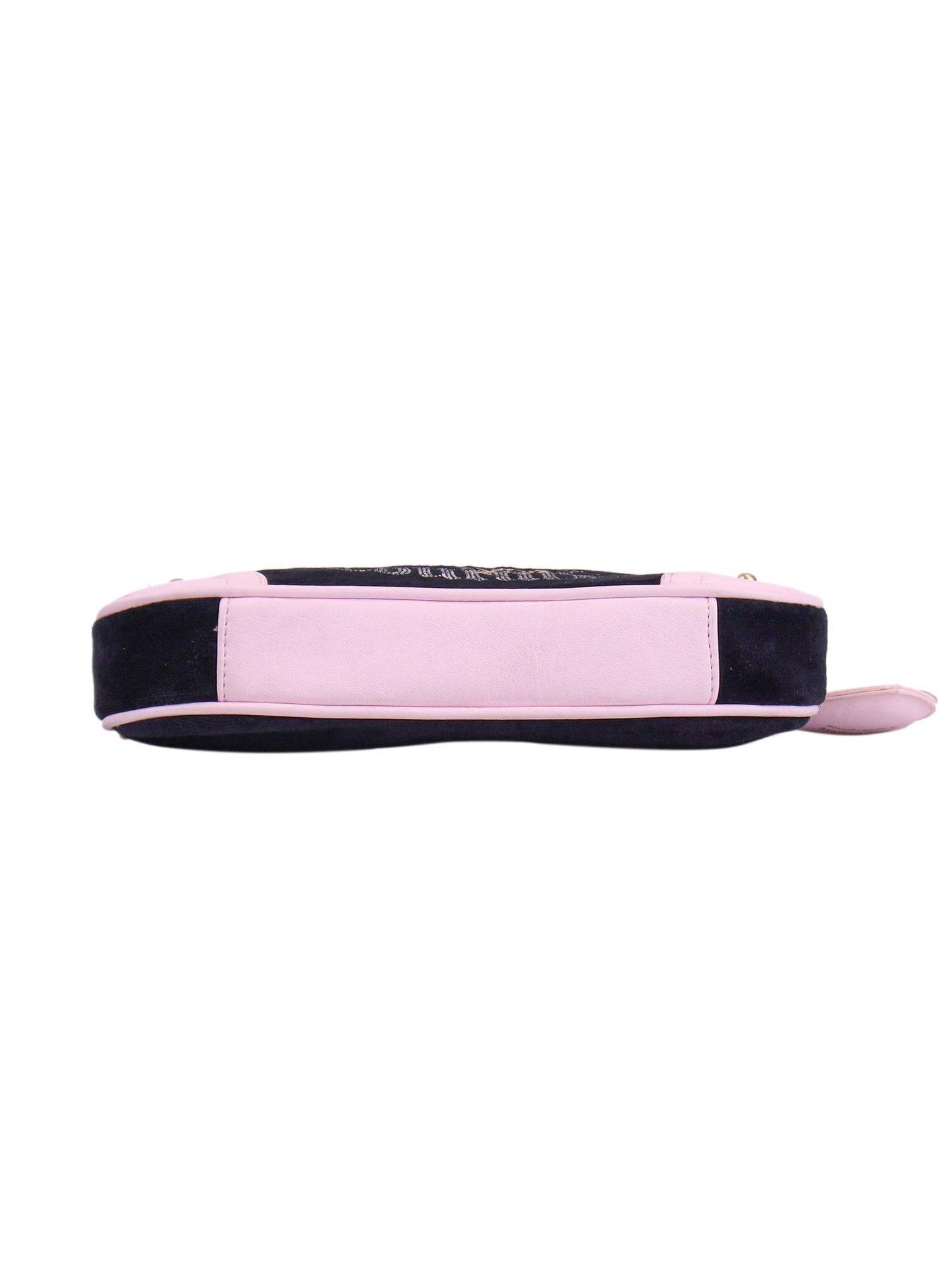 The Royal Bloom Shoulder Bag showcases timeless glamour with its rectangular shape, light pink base, black sides, and a pink handle at one end—elegant details viewed from the bottom.
