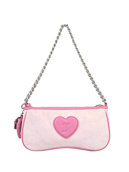 The Royal Bloom Shoulder Bag is a small pink and white bag with a sleek silhouette, silver chain strap, pink zipper, and a pink heart patch with a cursive J on the front—ideal for adding timeless glamour to any outfit.