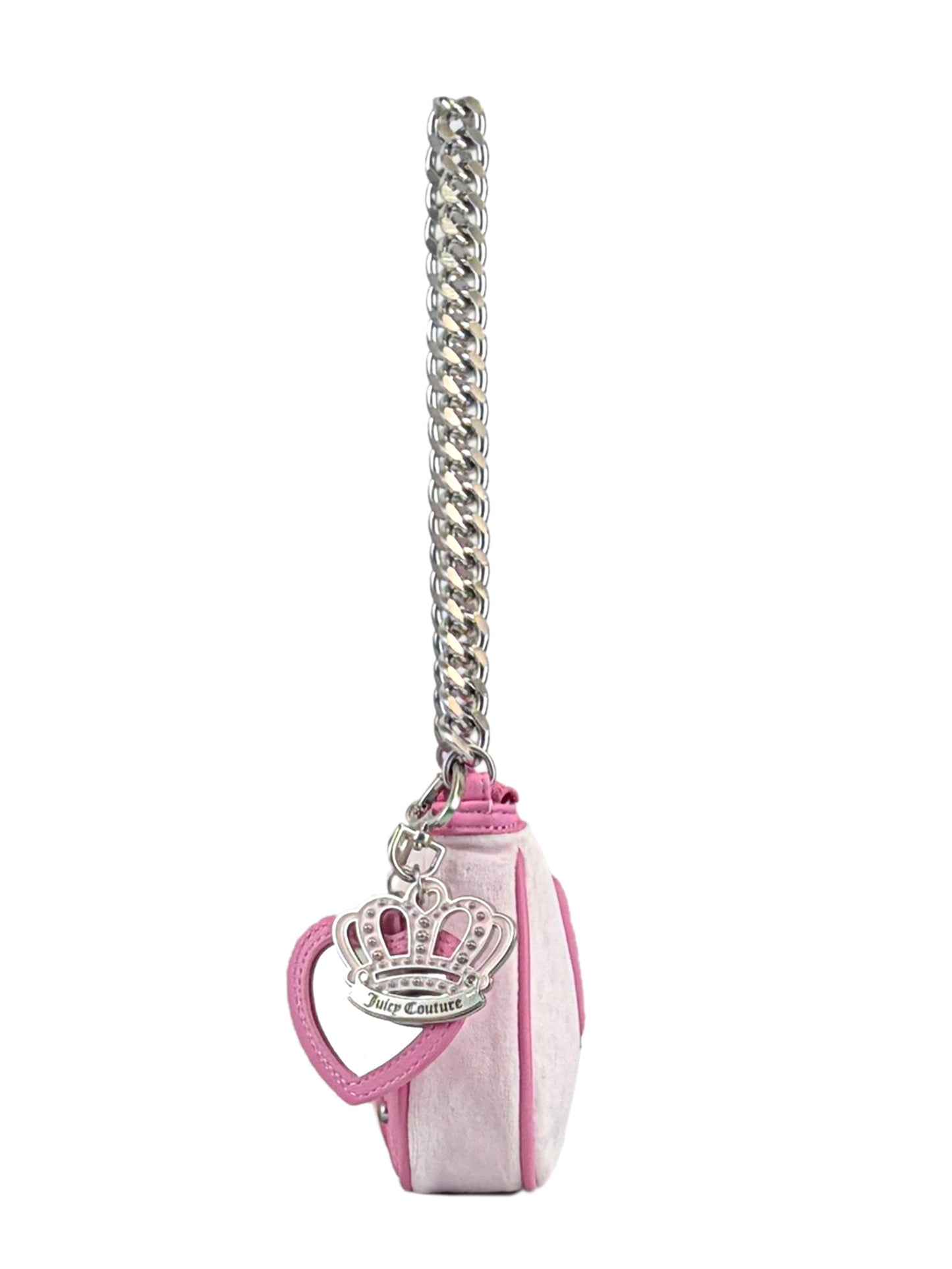 Side view of the Royal Bloom Shoulder Bag—a small pink Juicy Couture purse with a sleek shape, chunky silver chain strap, and a heart keychain featuring a crown and Juicy Couture logo for added glamour.