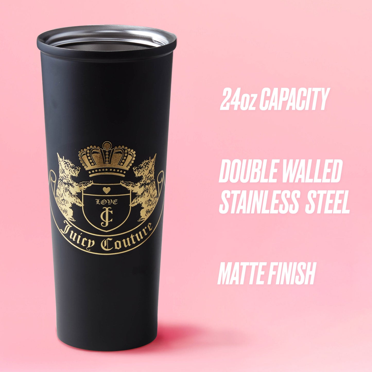 A Couture Hydration Stainless Steel Tumbler Cup from the 6-Piece Set in black, featuring a gold crest logo and matte finish, stands on a pink background. Beside it: 24oz capacity and double-walled stainless steel construction.