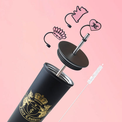 The Couture Hydration Stainless Steel Tumbler Cup 6-Piece Set features a black tumbler with gold branding, lid, straw, and straw toppers displayed on a pink background—a stylish gift set for any occasion.