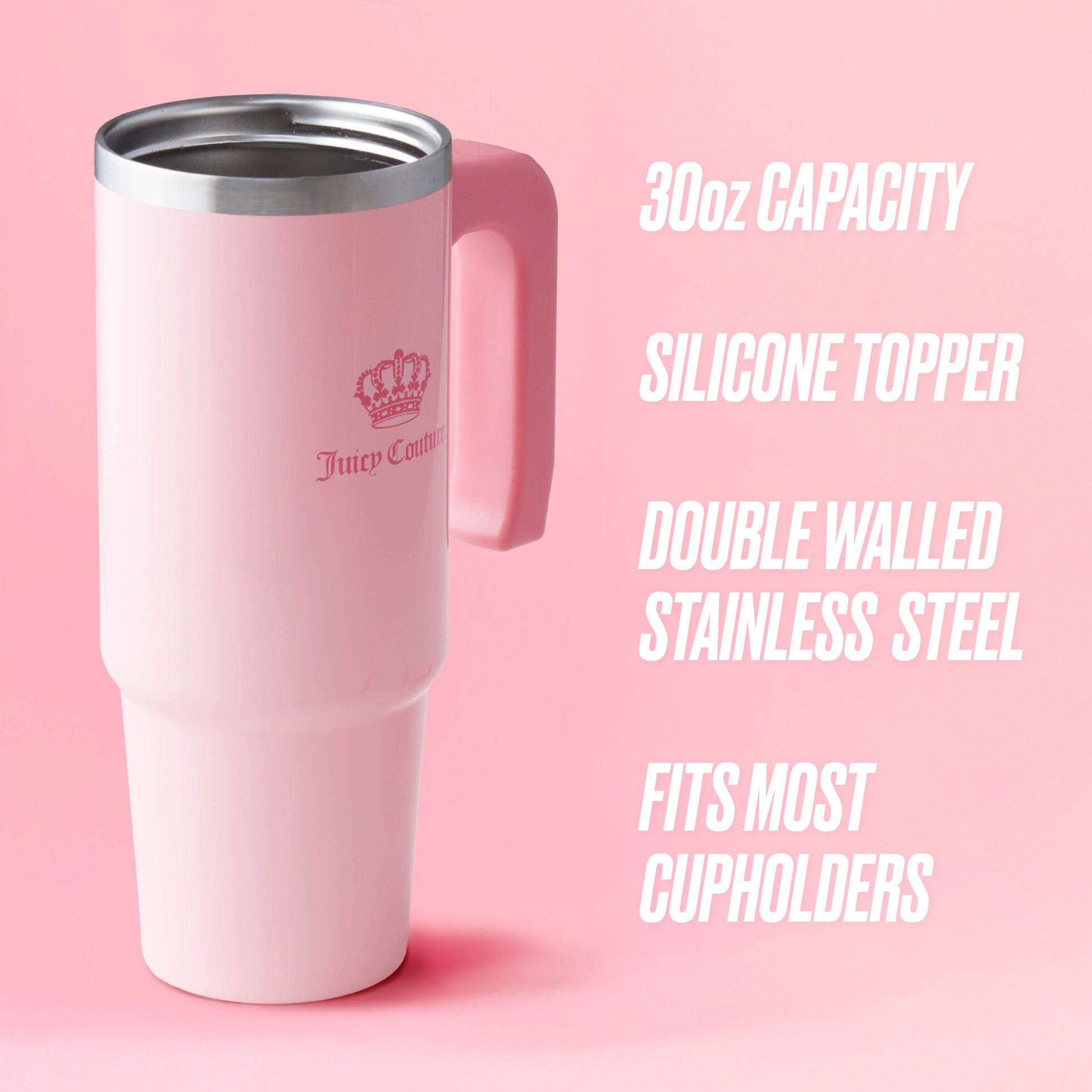 The Jetsetter Hydration Stainless Steel Tumbler with Neoprene Crossbody Pouch is shown in large pink, featuring a handle, logo, metal rim, 30oz capacity, silicone topper, double-walled steel build, and fits cupholders with ease.