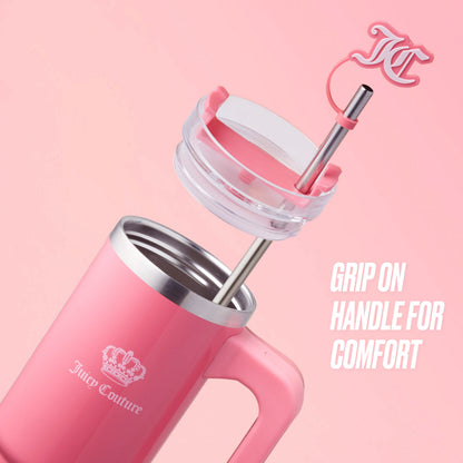 The Jetsetter Hydration Stainless Steel Tumbler with Neoprene Crossbody Pouch is pink with a silver straw, clear lid, and pink handle. It features a slightly open lid, pink logo charm on the straw, and "GRIP ON HANDLE FOR COMFORT" text.