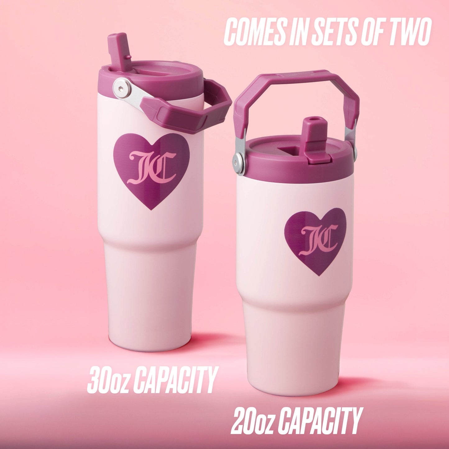 The Flip Flow Hydration Stainless Steel Tumbler Cup 2-Pack features two pink travel mugs with purple hearts and handles, set against a pink background. The insulated gift set includes 30oz and 20oz tumblers, ideal for stylish travel.
