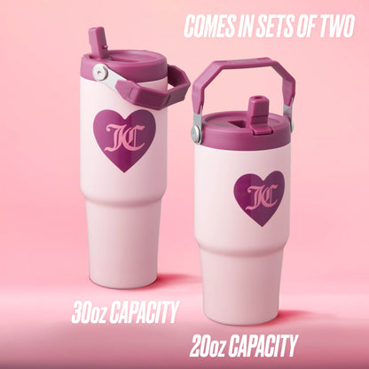 The Flip Flow Hydration Stainless Steel Tumbler Cup 2-Pack features two pink travel mugs with purple hearts and handles, set against a pink background. The insulated gift set includes 30oz and 20oz tumblers, ideal for stylish travel.