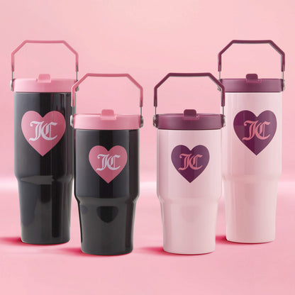 Two Flip Flow Hydration Stainless Steel Tumbler Cup 2-Packs are arranged in a row against a pink background, featuring black and light pink tumblers with heart logos and matching lids.