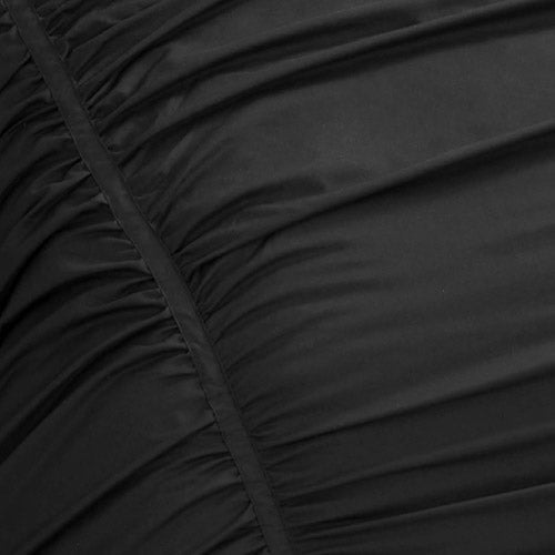 Close-up of the Ribbon Ruched Comforter Set in black, featuring diagonal gathered seams and textured folds for a pleated, ruched appearance.