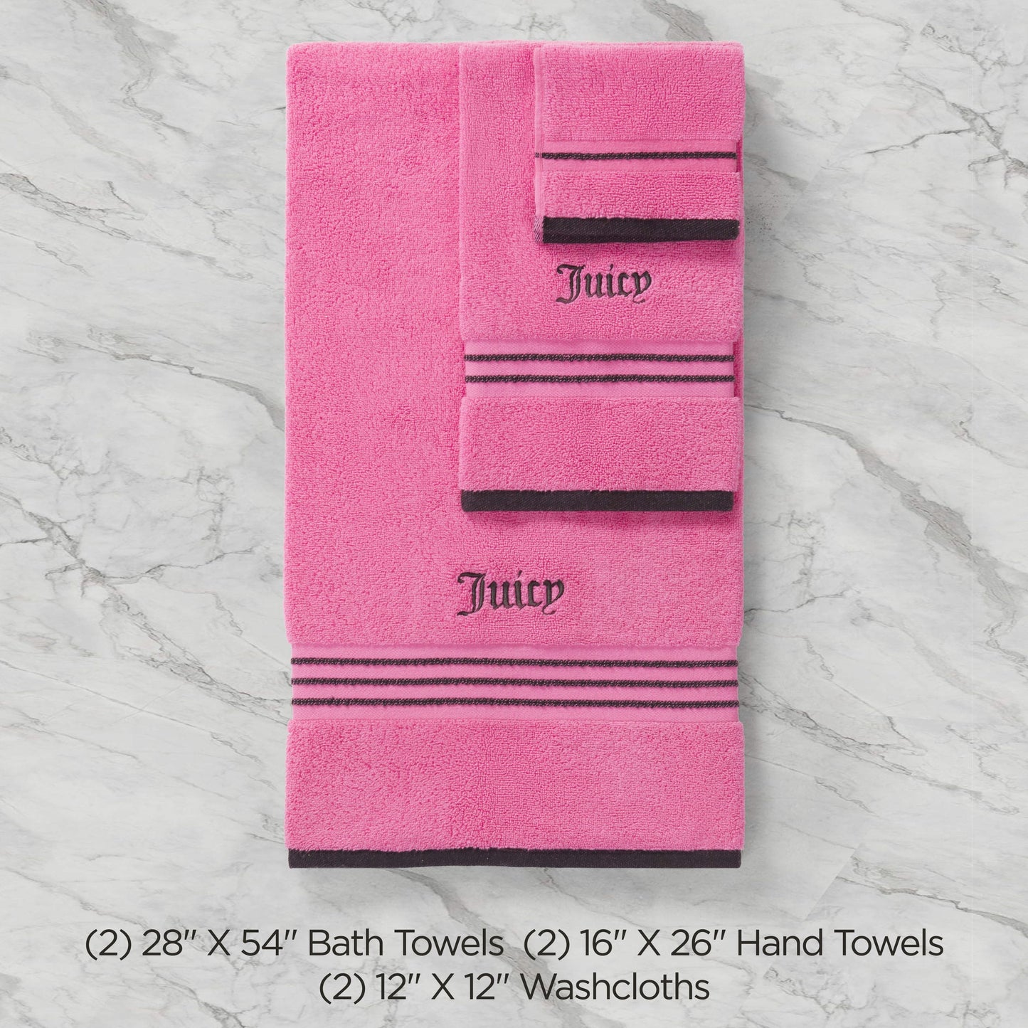 The Neon Border Bath Towel Set includes two pink bath towels, two hand towels, and two washcloths with black stripes and Juicy embroidery, all arranged on a light marble surface. Sizes listed below.