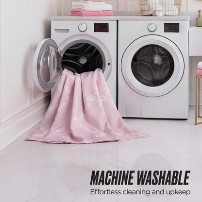 A pink Shower Curtain and Hooks Set with white crown patterns is shown near a modern washer and dryer—ideal for enhancing your bathroom decor. The text reads: MACHINE WASHABLE - Effortless cleaning and upkeep.
