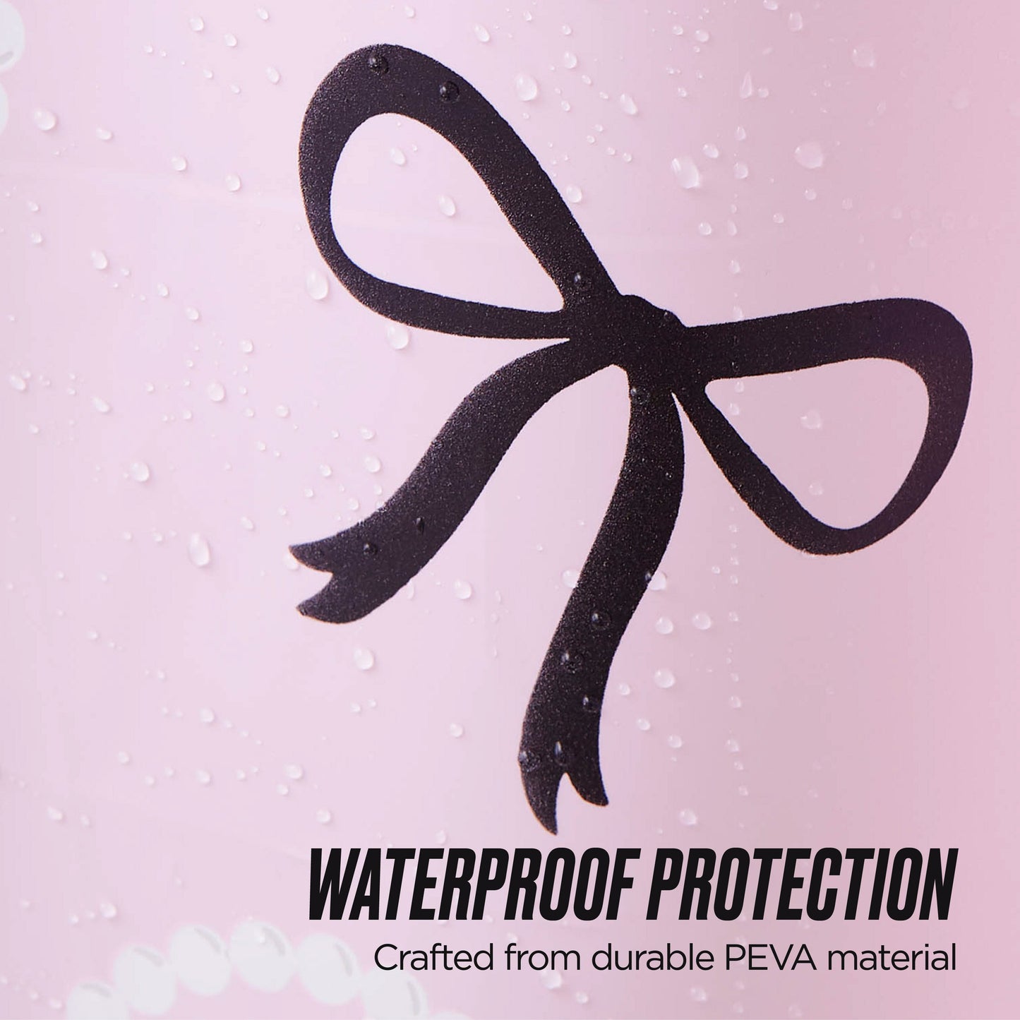 Close-up of the PEVA Shower Curtain Liner in pink with water droplets and a black bow design. Crafted from durable, waterproof PEVA material for lasting protection—perfect for adding style and function to your bathroom decor.