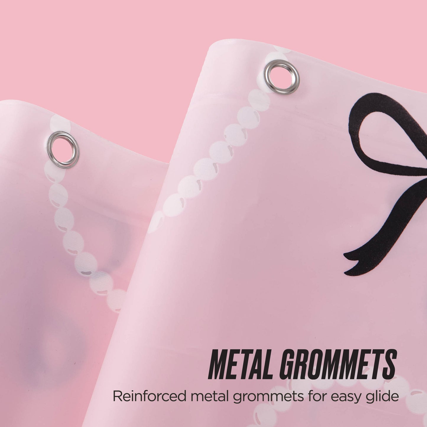 Close-up of the PEVA Shower Curtain Liner with reinforced metal grommets for smooth movement, shown in pink with a stylish black bow print. Text: Metal Grommets—Reinforced for easy glide.
