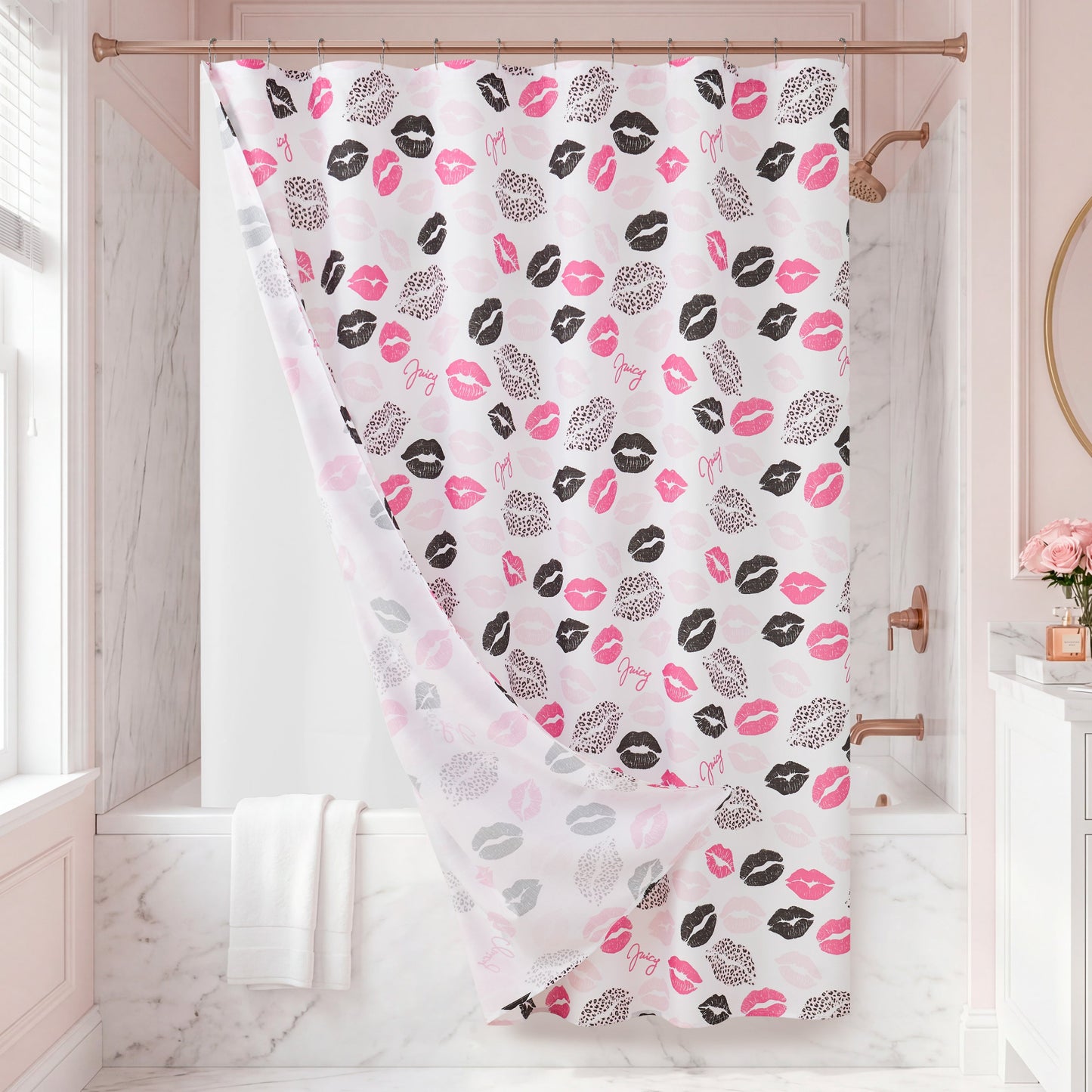 The Cheetah Kisses Shower Curtain with PEVA Liner and Hooks 14-Piece Set makes a bold statement in this marble bathroom, featuring a white background decorated with playful pink and black lipstick kiss prints and chic animal patterns. A neatly folded white towel rests on the tub, enhancing the stylish decor, while a small vase of pink flowers adds a cheerful touch to the window ledge.