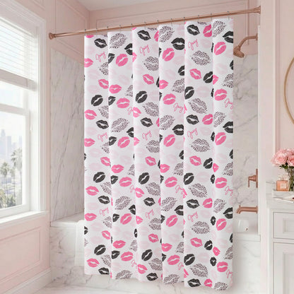 The Cheetah Kisses Shower Curtain with PEVA Liner and Hooks 14-Piece Set features a bold white design adorned with pink and black lip prints and the word "Oops!" in pink, bringing Juicy Couture-inspired style to a bright, elegant bathroom with marble walls and chic pink accents—perfect for adding playful flair to your bathroom decor.