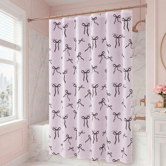 A bathroom with marble walls features a statement shower curtain—the Bow Leopard Shower Curtain with PEVA Liner and Hooks 14-Piece Set, showcasing chic bow patterns. A vase filled with pink flowers sits on the counter, while sunlight pours through a window, adding an elegant touch to the overall bathroom decor.