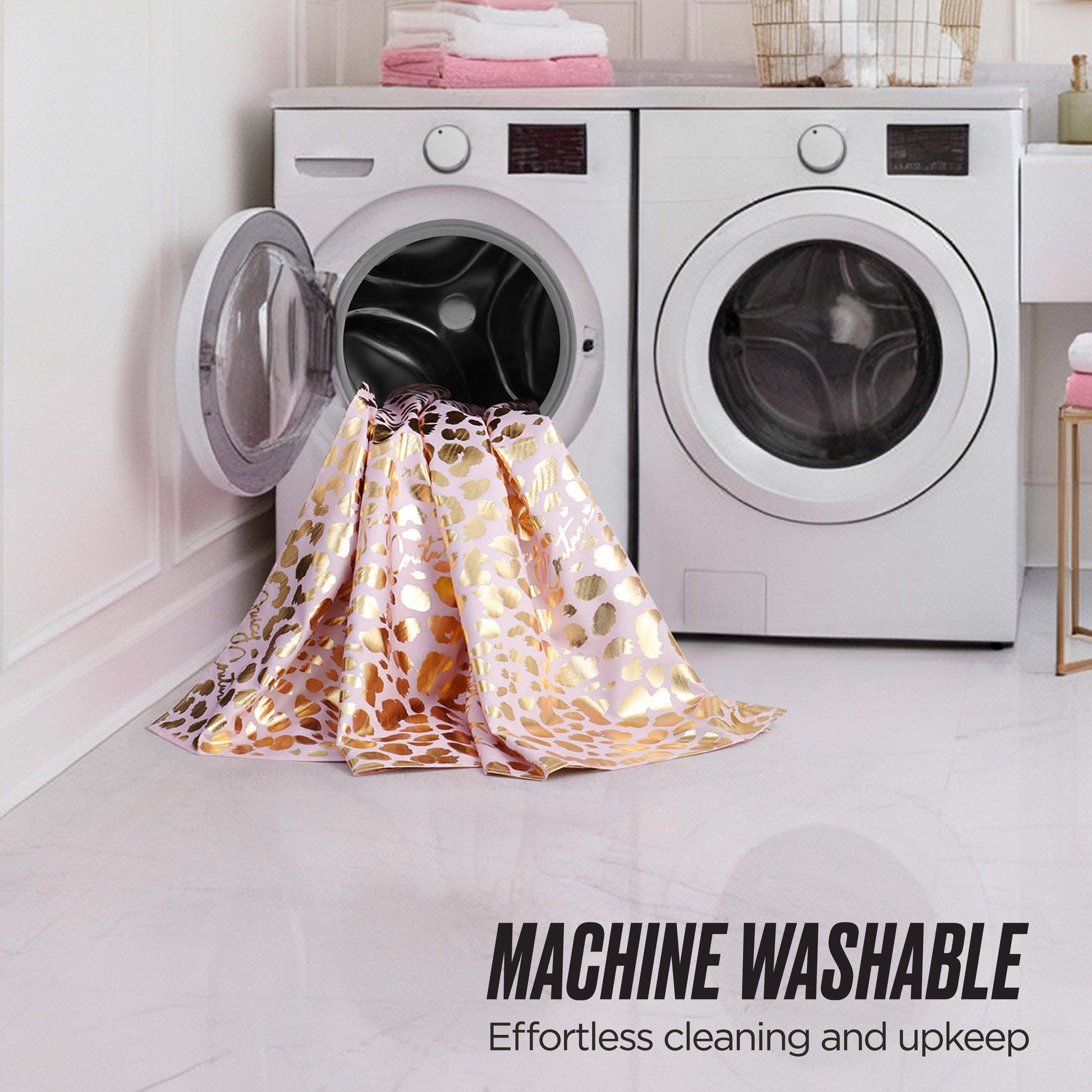 A Shower Curtain and Hooks Set hangs in front of an open washing machine, with a dryer nearby in a sunny laundry room. Text reads: MACHINE WASHABLE – Easy cleaning for effortless bathroom decor upkeep.