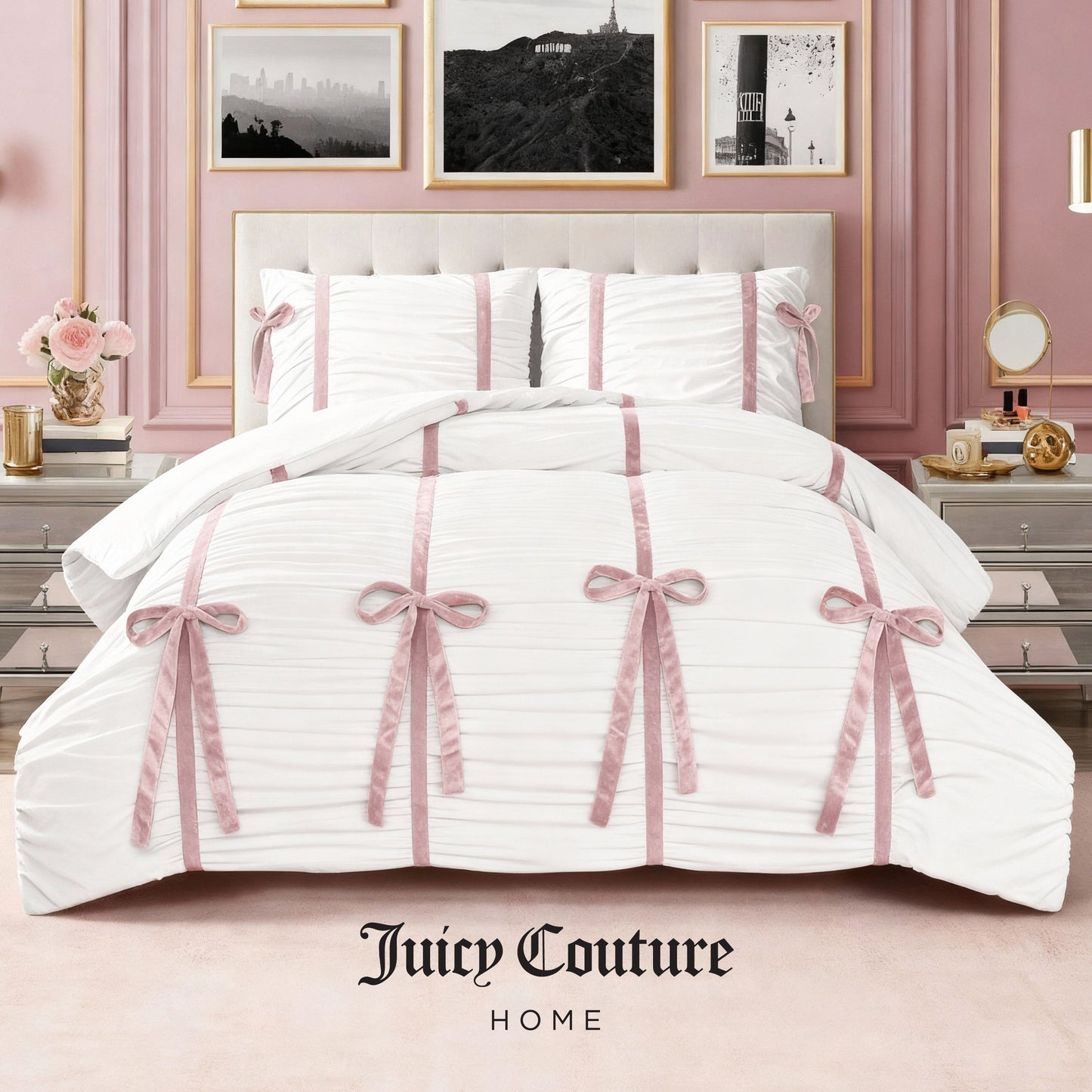 The Amelie Bows Ruched Comforter Set by Juicy Couture, featuring pink velvet bows and matching pillows, adds style to a pink-themed bedroom. The ultra-soft comforter displays the Juicy Couture Home logo at the bottom.