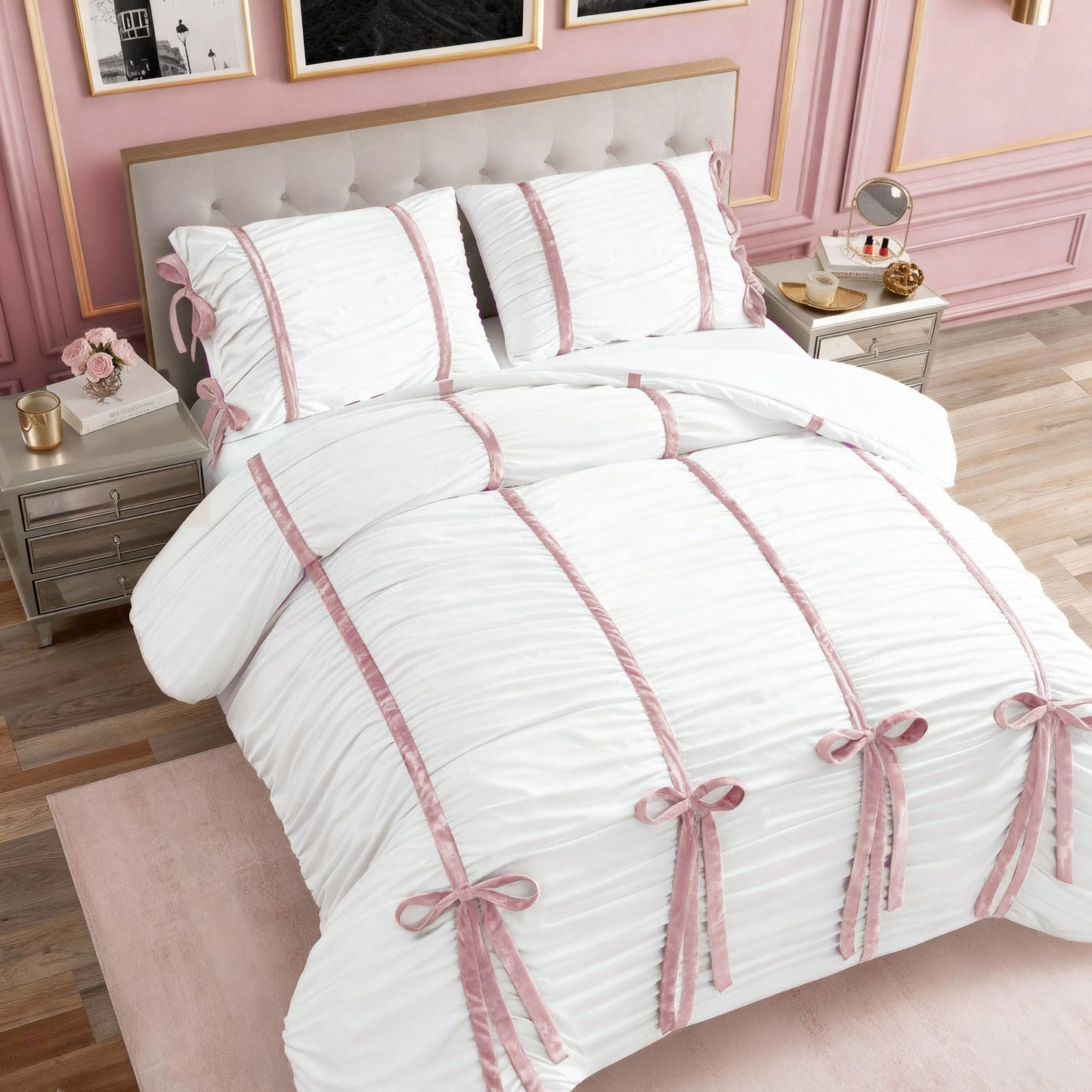 A neatly made bed with the Amelie Bows Ruched Comforter Set, featuring white bedding adorned with vertical pink ruffled ribbons and velvet bows, in an elegant bedroom with pink walls, silver nightstands, and a pink rug.