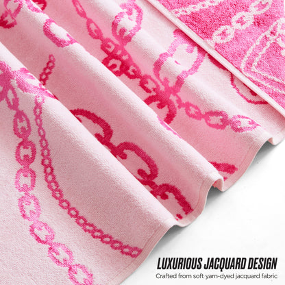 Close-up of the Printed Jacquard Bath Towel Set in soft pink with a darker pink interlocking chain pattern. “Luxurious Jacquard Design. Crafted from soft, yarn-dyed jacquard fabric.” Perfect for adding elegance to any bathroom.