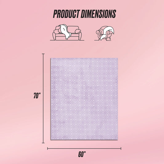 A graphic displays the Plush Oversized Throw Blanket in light purple pattern, measuring 70"x60". Illustrations show one person cozy on a couch and another wrapped in the blanket. Above, text reads “Product Dimensions.”.