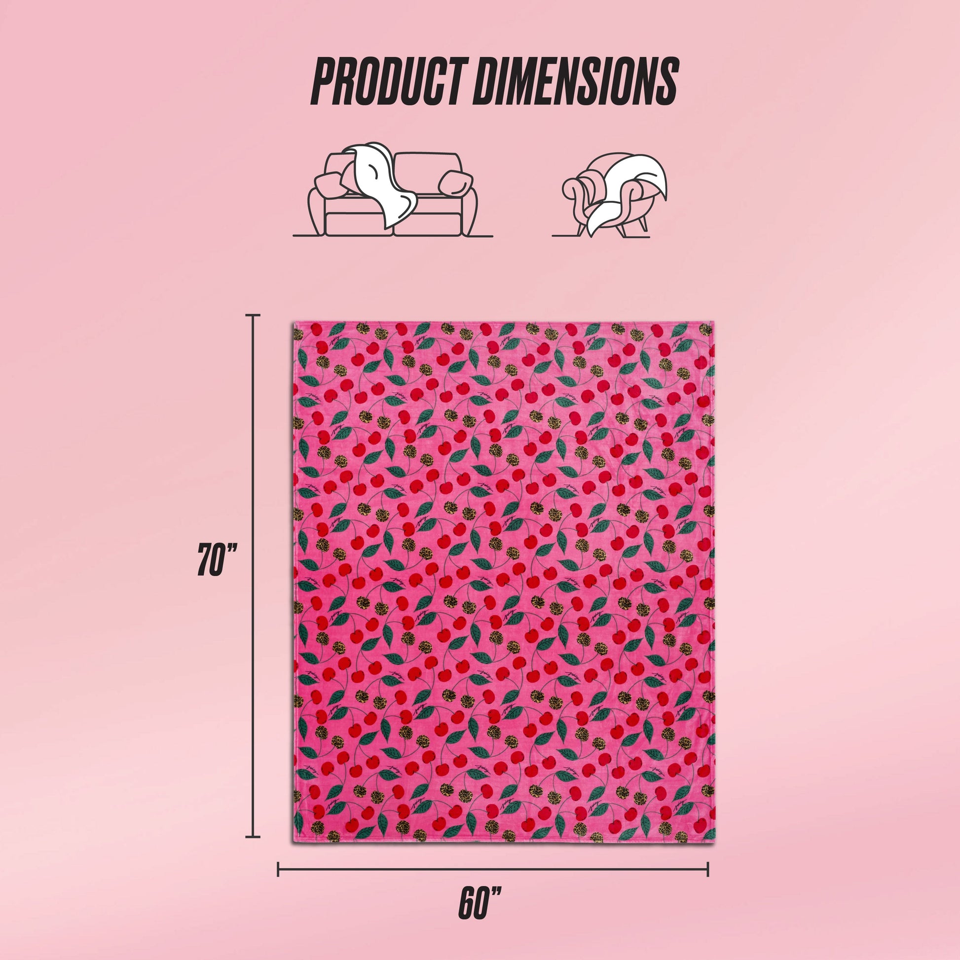 A Plush Oversized Throw Blanket with a pink base and colorful cherry pattern is shown, measuring 70" x 60". Illustrations show the blanket on a couch and wrapped around a person, highlighting the product dimensions.
