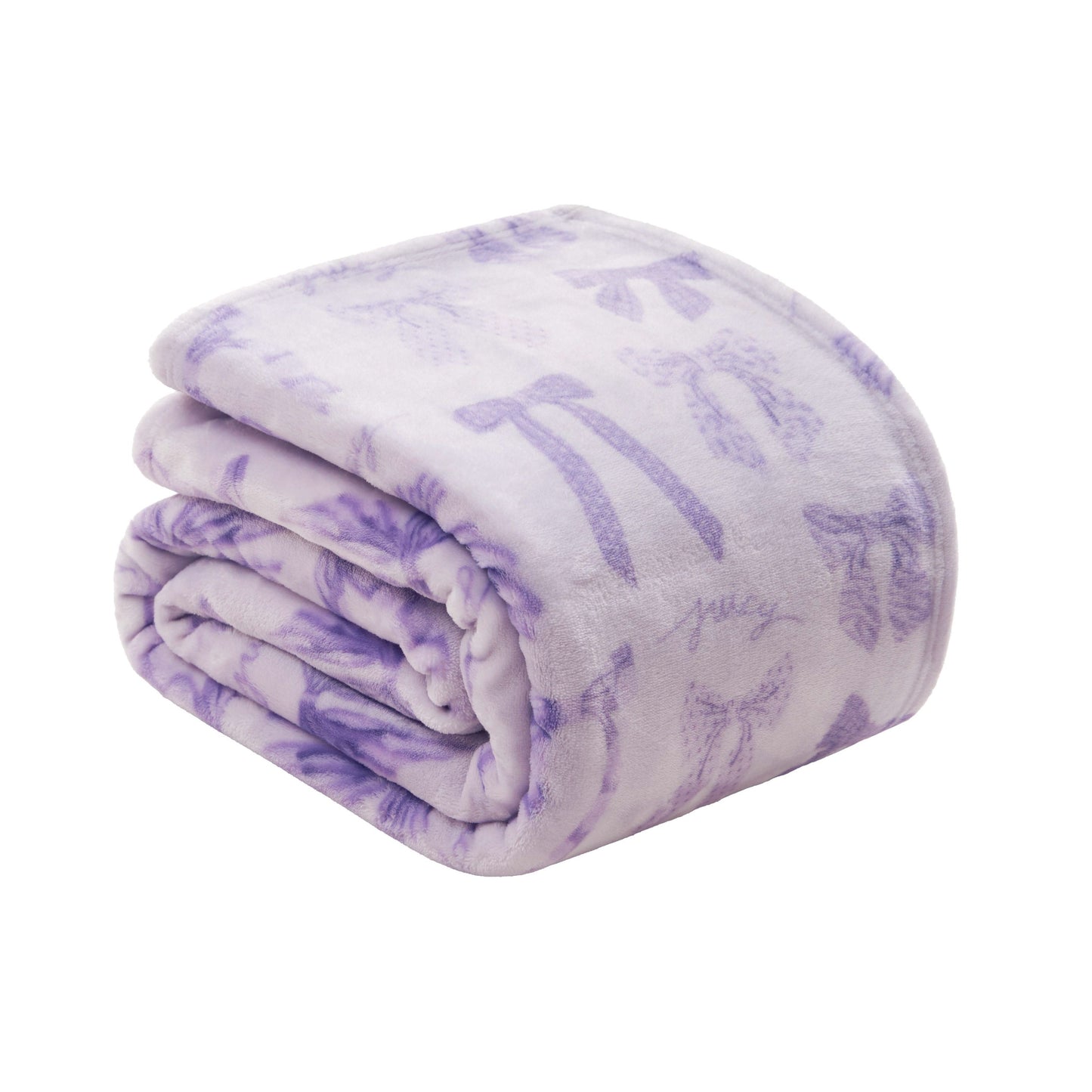 The Plush Oversized Throw Blanket by Juicy Couture is ultra-soft, light purple with dark purple bows and "juicy" print, adding cozy style to any space.