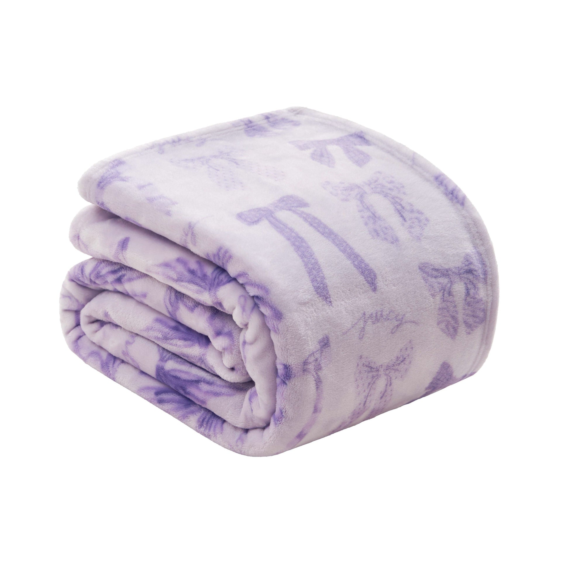 The Plush Oversized Throw Blanket by Juicy Couture is ultra-soft, light purple with dark purple bows and "juicy" print, adding cozy style to any space.