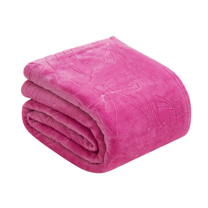 The Embossed Plush Oversized Throw Blanket in bright pink, featuring a bow pattern, is neatly folded and displayed on a white background.