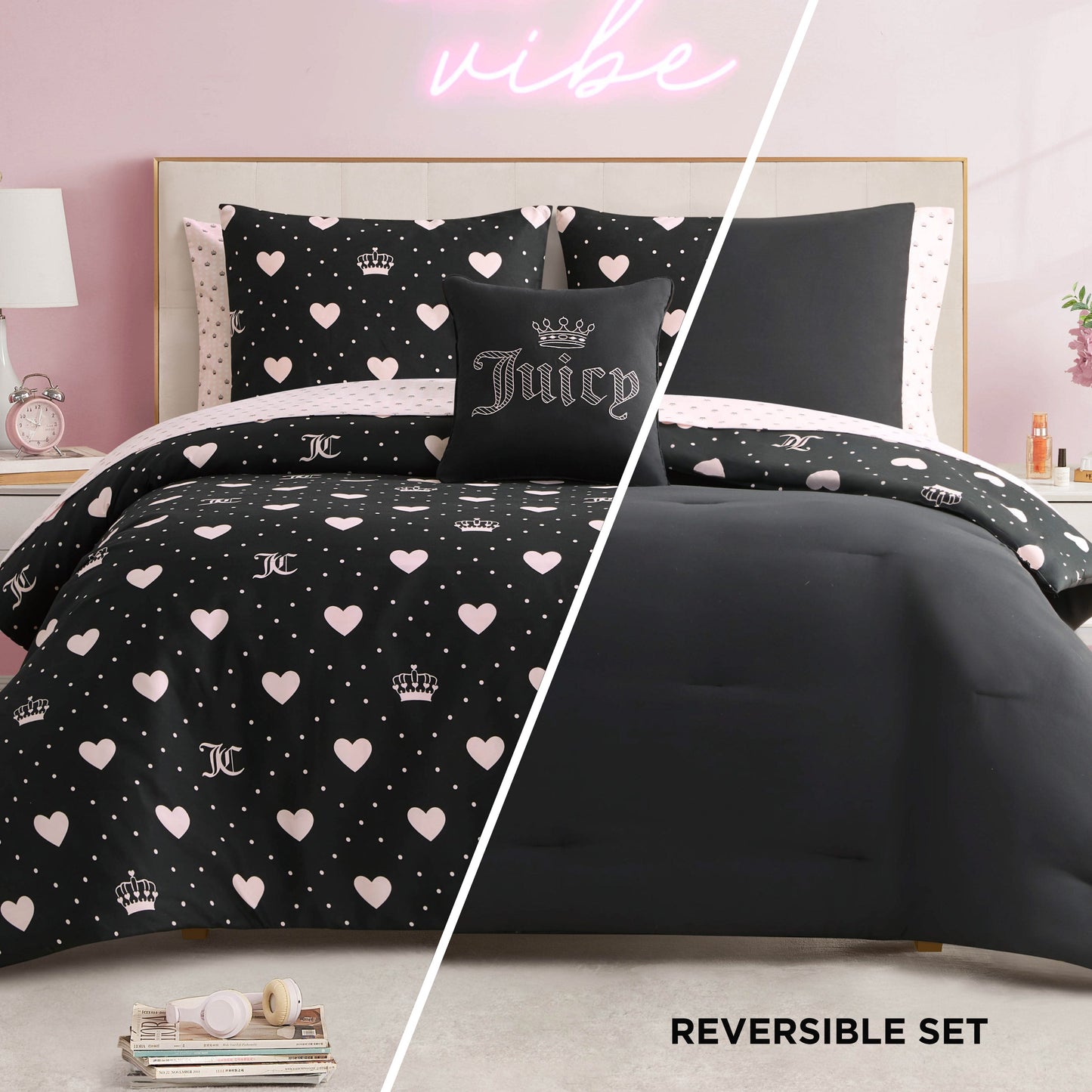 Create a glam bedding retreat with the Diamond Hearts Black Comforter Bed in a Bag Bedding Set, featuring black and pink hearts, crowns, and dots on one side and solid black on the other—all styled atop a light-colored bed frame.