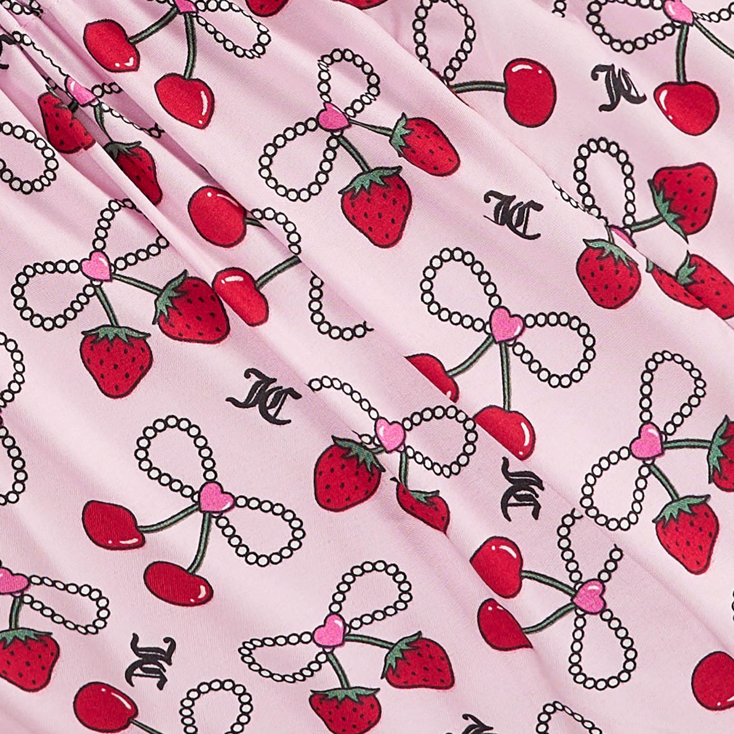 This pink Microfiber Sheet Set With Extra Pillowcases features a playful pattern of strawberries, cherries, pearl bow necklaces, and black interlocking CC logos—adding whimsical charm to any luxury bedding collection.