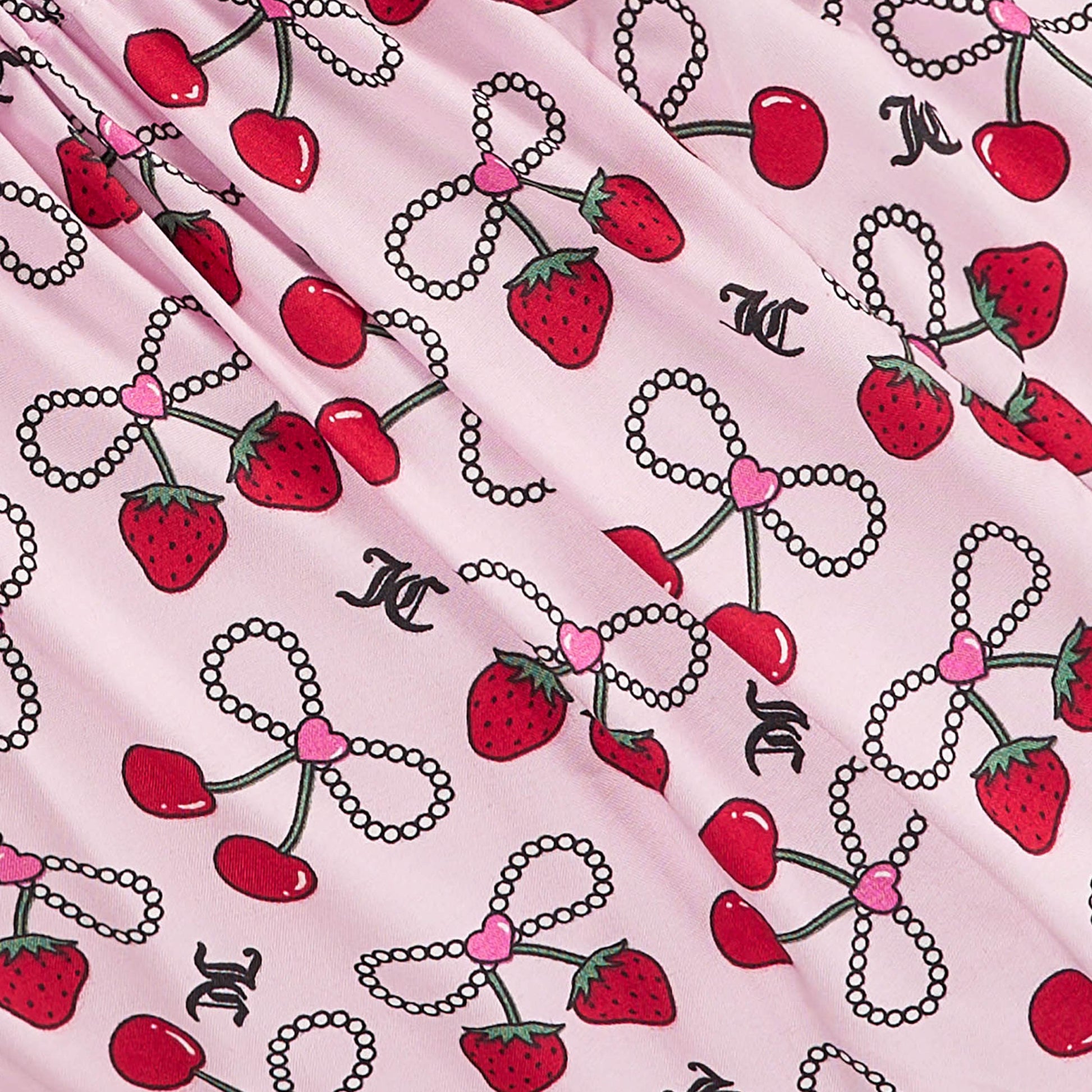 This pink Microfiber Sheet Set With Extra Pillowcases features a playful pattern of strawberries, cherries, pearl bow necklaces, and black interlocking CC logos—adding whimsical charm to any luxury bedding collection.