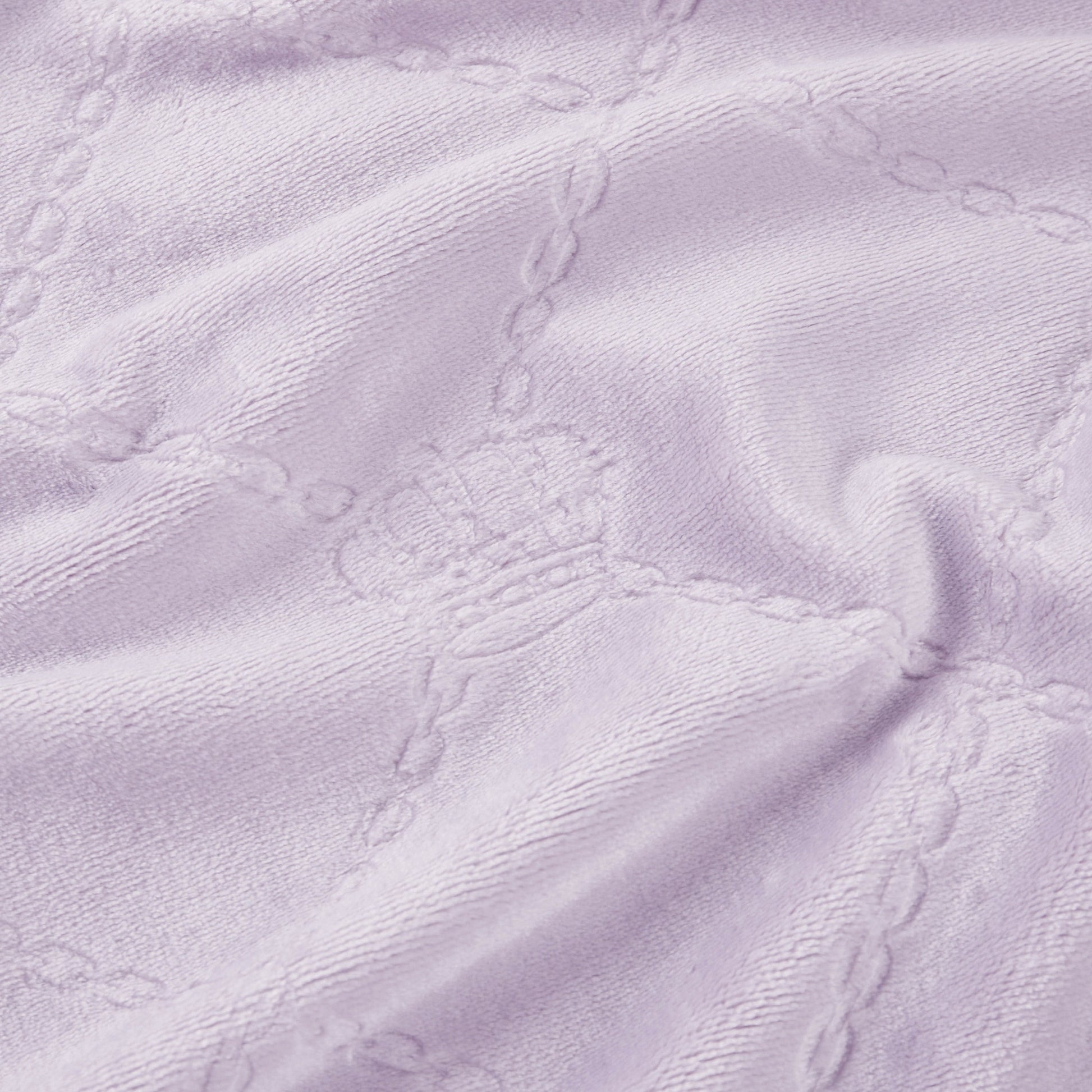 Light purple textured fabric with embossed crowns and chain-like grid lines creates a soft, cozy Plush Oversized Throw Blanket, 60" x 90". Perfect for adding Juicy Couture-inspired elegance to any twin bed.
