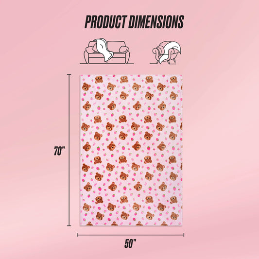 The Kids Plush Throw Blanket is an ultra-soft pink blanket with a cute bear and heart pattern, shown flat with labeled dimensions of 70" x 50". Icons above show it draped over a couch and over a person.
