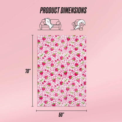 A pink background displays the Kids Plush Throw Blanket by Juicy Couture, featuring a floral pattern and ultra-soft texture, sized 70"x50". Icons above show it draped over a sofa and person, labeled Product Dimensions.