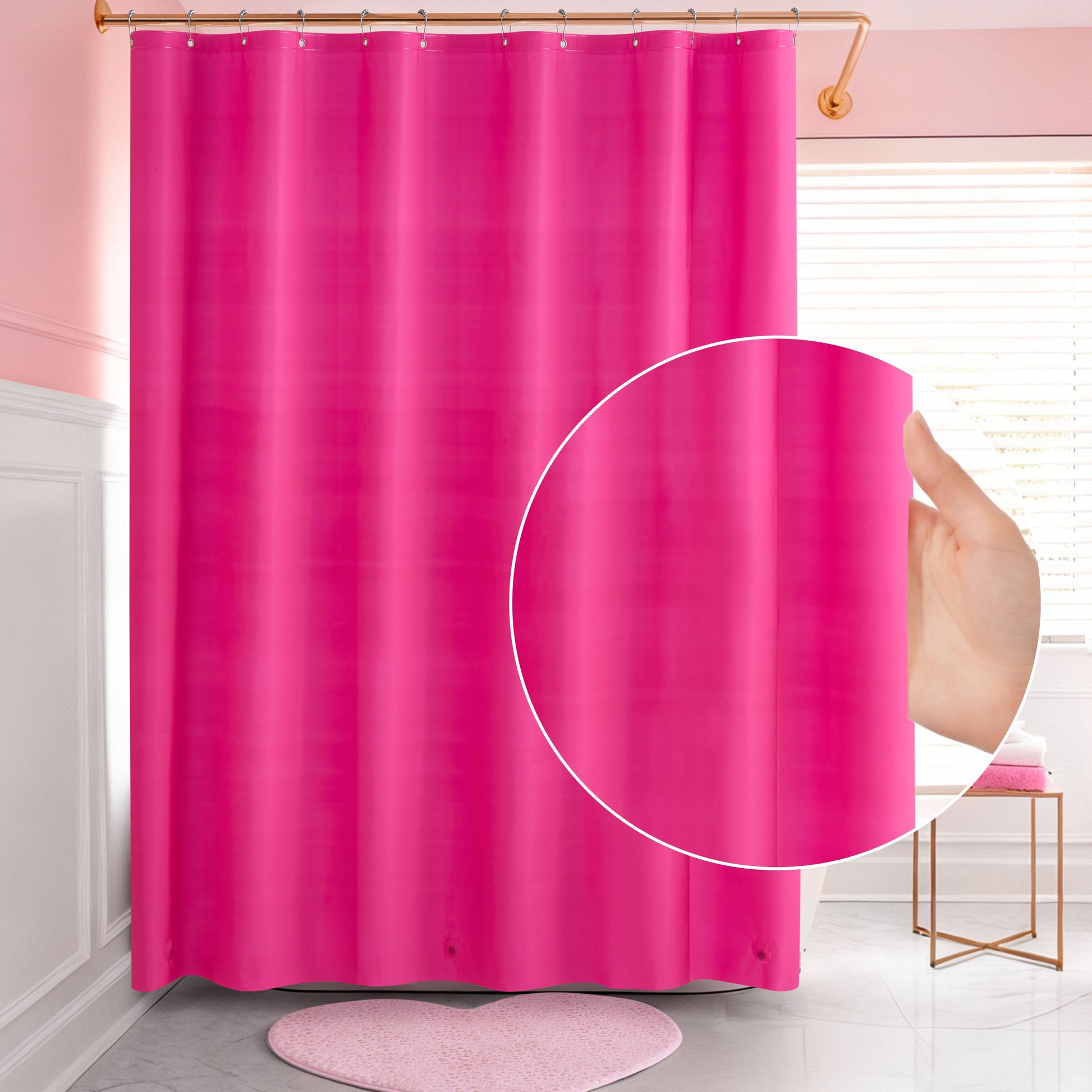 A hand holds a bright pink PEVA Shower Curtain Liner in a bathroom with pink walls, white wainscot, a round pink rug, and a window with white blinds. A circular inset highlights the waterproof liner material up close.
