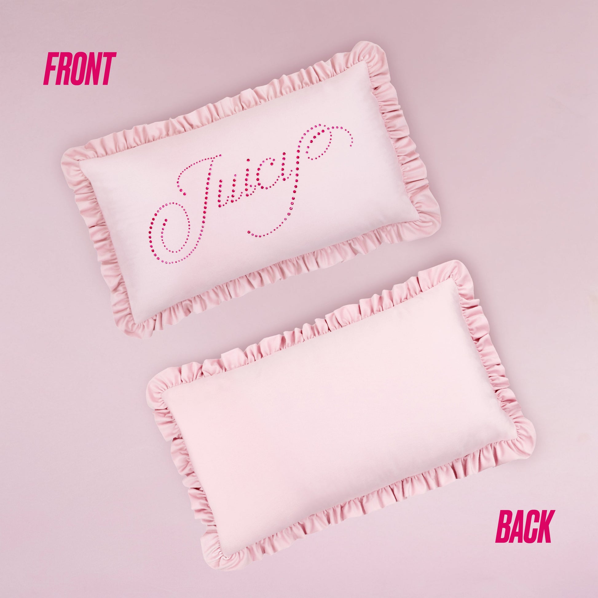 Two light pink Juicy Couture Ruffle Decorative Pillows with rectangular shapes rest on a pink background. The front pillow sparkles with "Juicy" in pink rhinestones; the back pillow is plain. FRONT and BACK labels are shown.