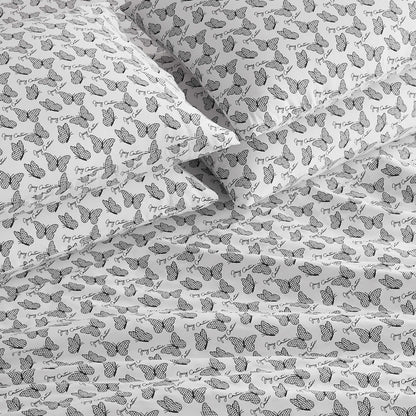 The Microfiber Sheet Set With Extra Pillowcases features a white base with black line-art butterflies, some accented with dots or stripes, and "Grey Cat" text throughout for a stylish touch to your bedding.